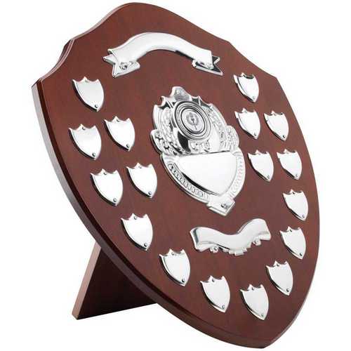 MAHOGANY SHIELD WITH CHROME FRONTS AND 17 RECORD SHIELDS (1in CENTRE) - 16in